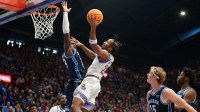 Kansas Jayhawks guard Darryn Peterson (22) shoots a layup against BYU Cougars during the game inside Allen Fieldhouse.