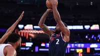 LA Clippers forward Kawhi Leonard (2) shoots the ball in front of New York Knicks center Karl-Anthony Towns (32) during the first half at Madison Square Garden.