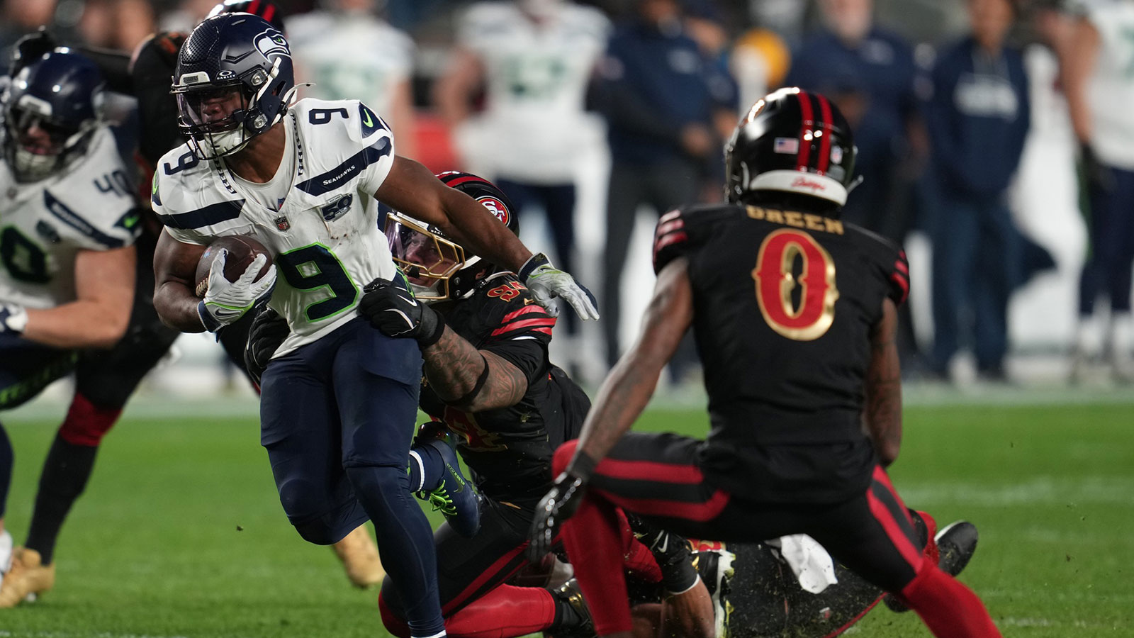 Seattle Seahawks running back Kenneth Walker III (9) rushes the ball against the San Francisco 49ers during the first half at Levi's Stadium.
