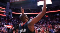 Houston Rockets forward Kevin Durant (7) celebrates with fans after defeating the Phoenix Suns at Toyota Center.