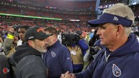 Cleveland Browns head coach Kevin Stefanski, left, shakes hands with Tennessee Titans interim head coach Mike McCoy after an NFL football game at Huntington Bank Field, Dec. 7, 2025, in Cleveland, Ohio.