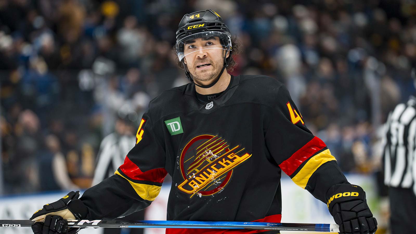 Vancouver Canucks forward Kiefer Sherwood (44) reacts to the loss against the Boston Bruins in overtime at Rogers Arena.