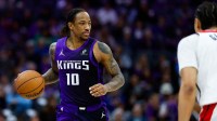 Kings guard DeMar DeRozan (10) dribbles the ball up the court during the third quarter against the Washington Wizards at Golden 1 Center with Kings' Keon Ellis in the background