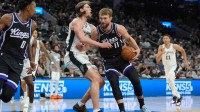 Sacramento Kings forward Domantas Sabonis (11) drives in against San Antonio Spurs forward Kelly Olynyk (8) in the second half at Frost Bank Center.