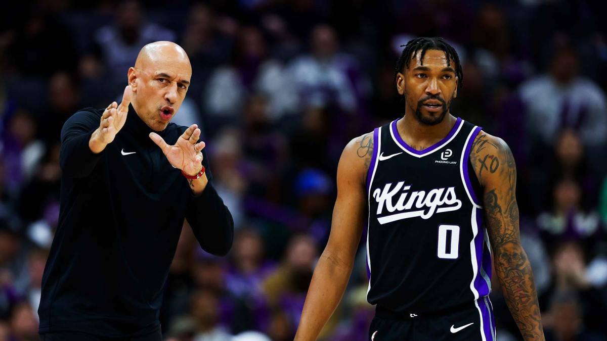 Kings head coach Doug Christie instructs guard Malik Monk