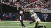 Atlanta Falcons quarterback Kirk Cousins (18) throws a pass during the game against the New Orleans Saints during the second half at Mercedes-Benz Stadium.