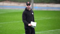 Washington Commanders offensive coordinator Kliff Kingsbury during practice at Ciudad Deportiva del Real Madrid.