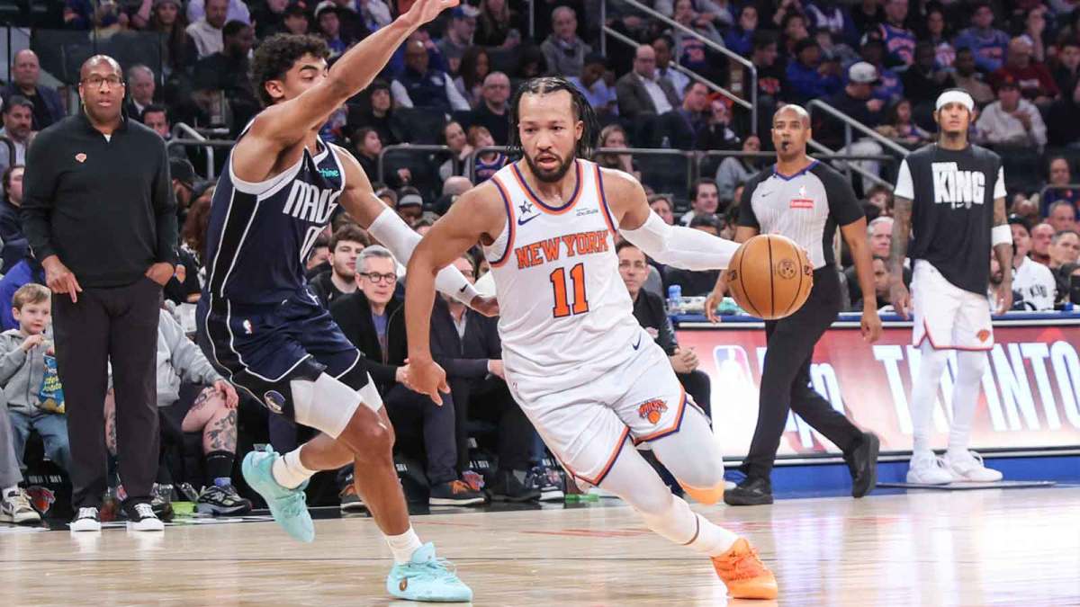New York Knicks guard Jalen Brunson (11) drives past Dallas Mavericks guard Max Christie (00) in the first quarter at Madison Square Garden.