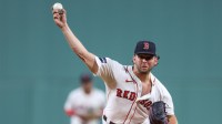 Boston Red Sox starting pitcher Kutter Crawford (50) throws a pitch during the first inning against the Baltimore Orioles at Fenway Park.