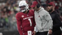 Arizona Cardinals head coach Jonathan Gannon talks with quarterback Kyler Murray (1) during the fourth quarter against the Seattle Seahawks at State Farm Stadium in Glendale on Jan. 7, 2024.