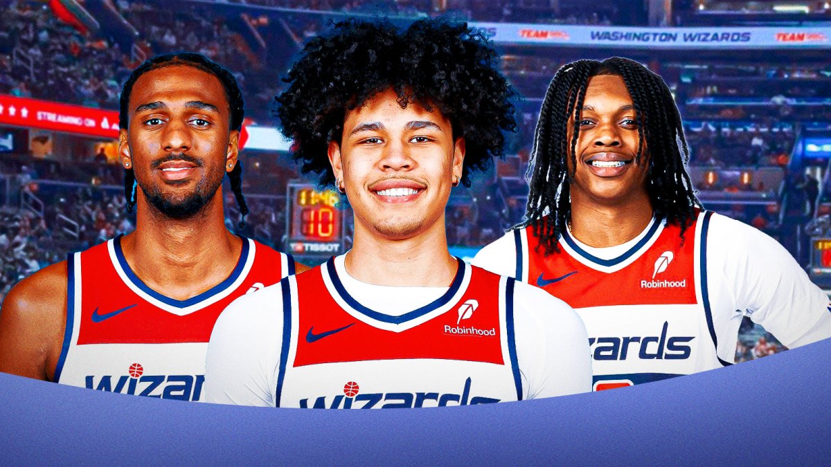 Kyshawn George in front of Alex Sarr and Bub Carrington