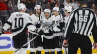 The LA Kings celebrate a goal by Los Angeles Kings left wing Kevin Fiala (22) during the third period against the Detroit Red Wings at Little Caesars Arena.