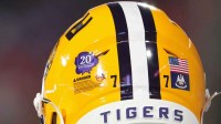 A detail view of a helmet worn by LSU Tigers offensive tackle Ory Williams (77) with a sticker on it to commemorate the 20th anniversary of hurricane Katrina during the first quarter at Memorial Stadium.