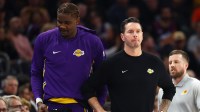 Lakers center Deandre Ayton (left) and head coach JJ Redick against the Phoenix Suns at Mortgage Matchup Center