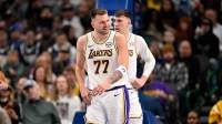 Los Angeles Lakers guard Luka Doncic (77) reacts to being fouled during the first quarter against the Dallas Mavericks at the American Airlines Center.