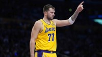 ; Los Angeles Lakers guard Luka Doncic (77) gestures against the Charlotte Hornets in the second half at Crypto.com Arena.