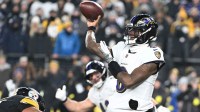 Baltimore Ravens quarterback Lamar Jackson (8) drops back to pass against the Pittsburgh Steelers during the first half at Acrisure Stadium.