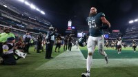 Philadelphia Eagles offensive tackle Lane Johnson (65) runs off the field after the game against the Dallas Cowboys at Lincoln Financial Field.