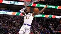 Los Angeles Lakers forward LeBron James (23) dunks the ball against the Dallas Mavericks during the second half at the American Airlines Center. Mandatory Credit: Jerome Miron-Imagn Images