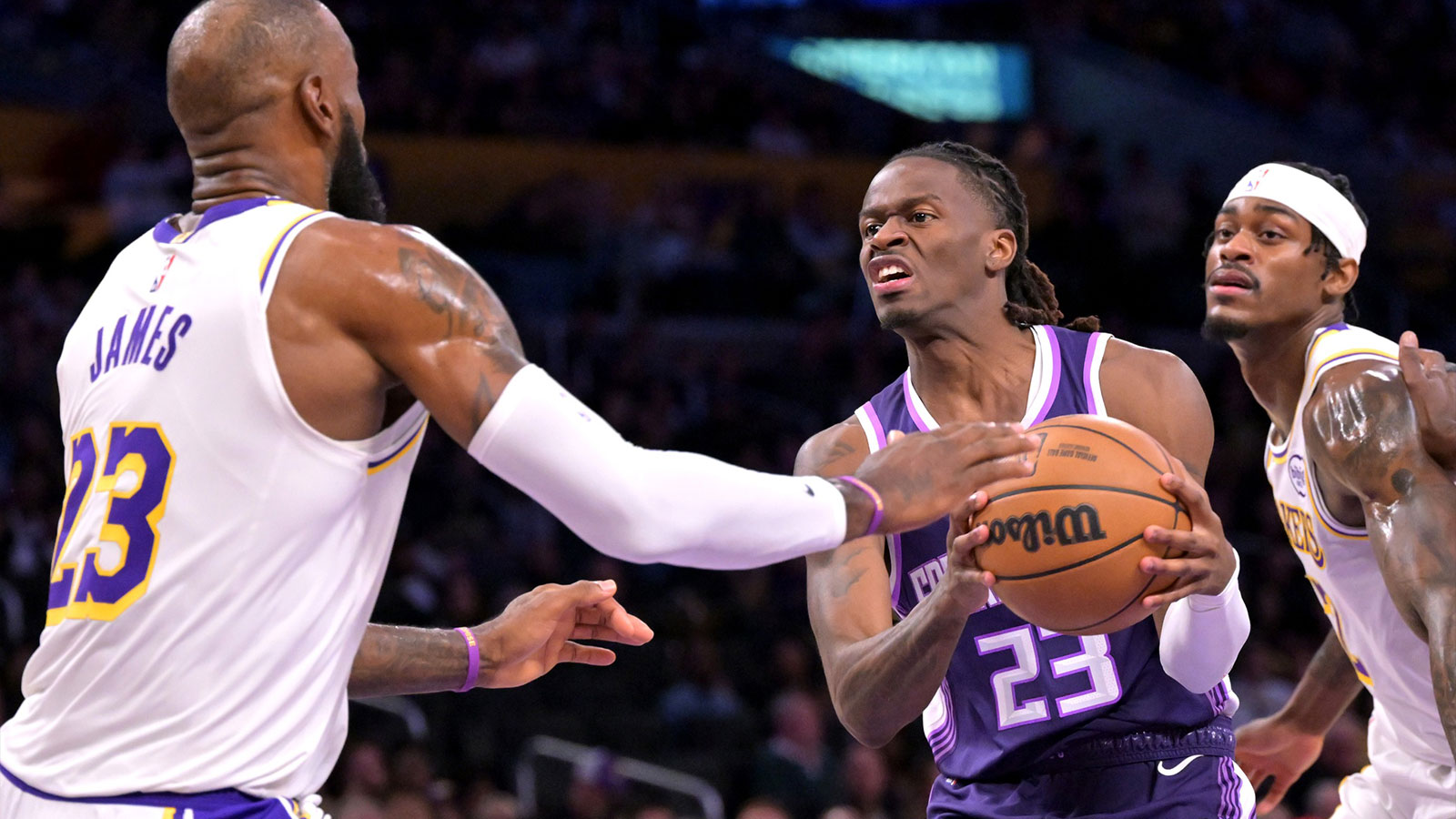 Los Angeles Lakers forward LeBron James (23) defends Sacramento Kings guard Keon Ellis (23) in the second half at Crypto.com Arena.