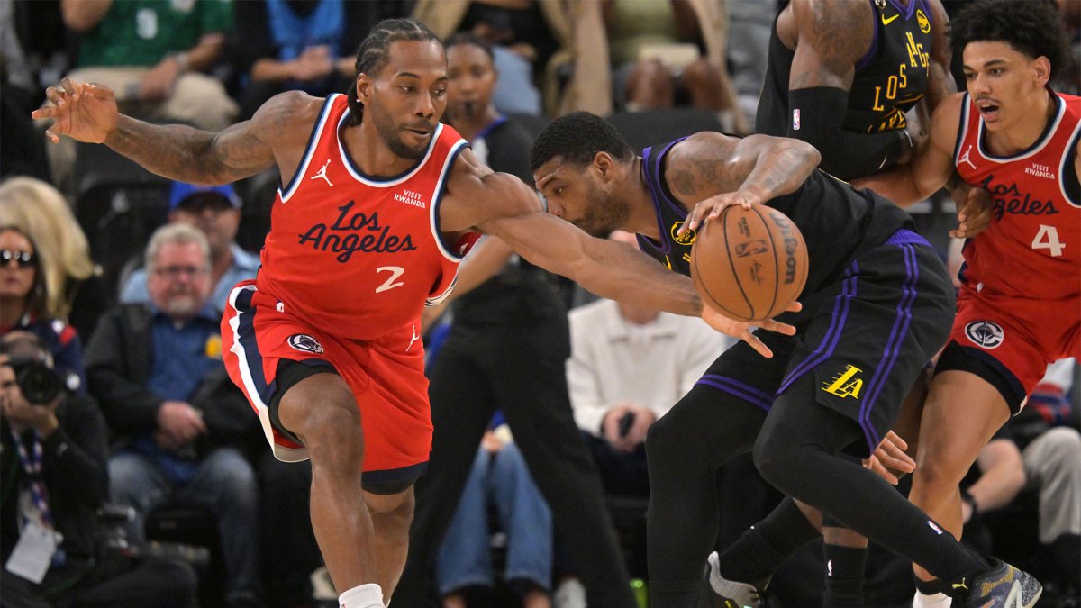 Los Angeles Clippers forward Kawhi Leonard (2) steals the ball from Los Angeles Lakers guard Marcus Smart (36) in the first half at Intuit Dome