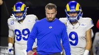 Los Angeles Rams head coach Sean McVay with defensive tackle Aaron Donald (99) and quarterback Matthew Stafford (9) against the Arizona Cardinals at State Farm Stadium. Mandatory Credit: Mark J. Rebilas-Imagn Images