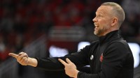 Louisville Cardinals head coach Pat Kelsey calls out instructions during the first half against the Boston College Eagles at KFC Yum! Center.