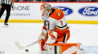 Anaheim Ducks goaltender Lukas Dostal (1) makes a save in the second period against the Colorado Avalanche at Ball Arena.