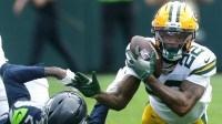 Green Bay Packers wide receiver Matthew Golden (22) catches a pass agains the defense of Seattle Seahawks cornerback Nehemiah Pritchett.