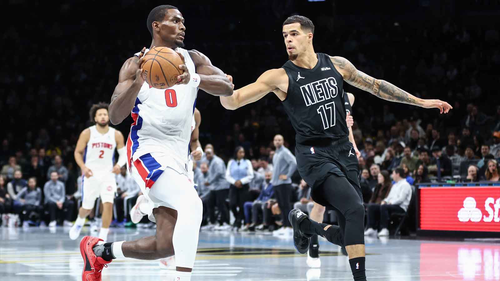 Detroit Pistons center Jalen Duren (0) looks to drive past Brooklyn Nets forward Michael Porter Jr. (17) in the first quarter at Barclays Center.