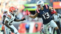 New England Patriots wide receiver Mack Hollins (13) runs with the ball against Cleveland Browns cornerback Denzel Ward (21) during the fourth quarter at Gillette Stadium.