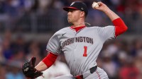 Washington Nationals starting pitcher MacKenzie Gore (1) throws against the Atlanta Braves in the second inning at Truist Park.