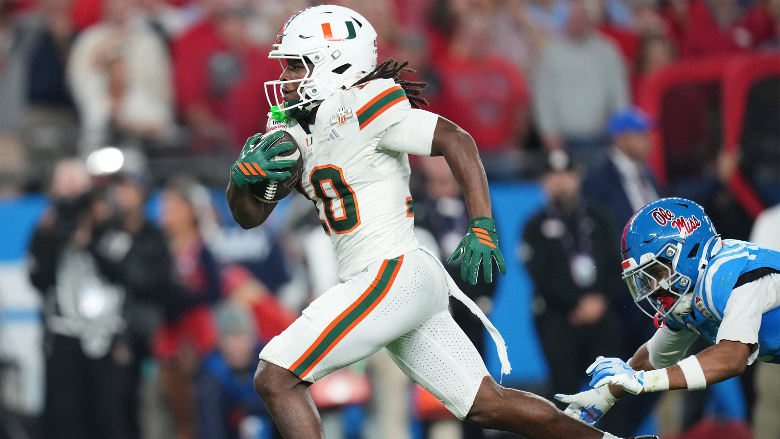Miami Hurricanes receiver Malachi Toney (10) catches a 36-yard touchdown against the Ole Miss Rebels during their Vrbo Fiesta Bowl matchup at State Farm Stadium on Jan. 8, 2026.