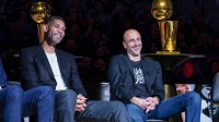 Former San Antonio Spurs greats Tim Duncan and Manu Ginobili laugh during Tony Parker's retirement ceremony at the AT&T Center.