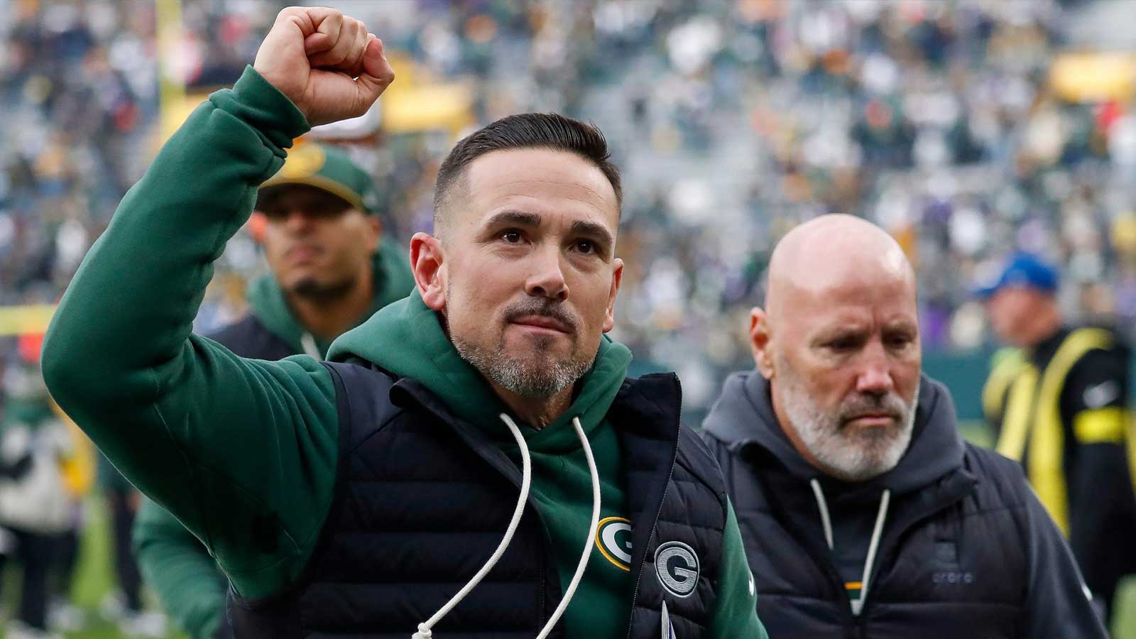 Green Bay Packers head coach Matt LaFleur pumps his fist as he runs off the field after defeating the Minnesota Vikings on Sunday, November 23, 2025, at Lambeau Field in Green Bay, Wis.