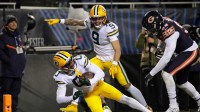 Green Bay Packers wide receiver Matthew Golden (0) scores a touchdown against Chicago Bears defensive end Montez Sweat (98) in the third quarter during their wild-card playoff football game Saturday, January 10, 2026, at Soldier Field in Chicago, Illinois.