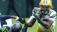 Green Bay Packers wide receiver Matthew Golden (22) catches a pass agains the defense of Seattle Seahawks cornerback Nehemiah Pritchett (28) on Saturday, August 23, 2025, at Lambeau Field in Green Bay, Wis. The Packers defeated the Seahawks 20-7.