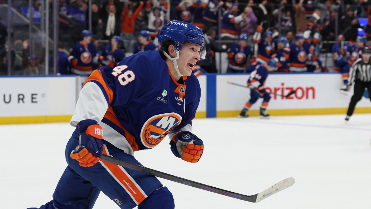 New York Islanders defenseman Matthew Schaefer (48) celebrates after scoring the winning goal in overtime against the Toronto Maple Leafs at UBS Arena.