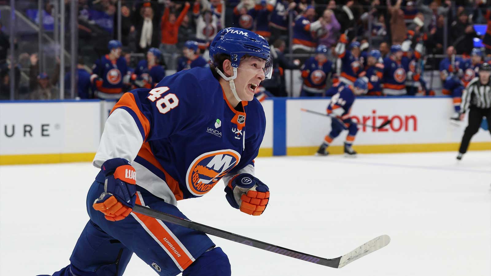 New York Islanders defenseman Matthew Schaefer (48) celebrates after scoring the winning goal in overtime against the Toronto Maple Leafs at UBS Arena.