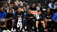 The Dallas Mavericks team bench looks on during the second half against the Denver Nuggets at the American Airlines Center. Mandatory Credit: Jerome Miron-Imagn Images