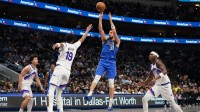 Dallas Mavericks guard Klay Thompson (31) shoots over Utah Jazz guard Ace Bailey (19) during the second half at American Airlines Center.