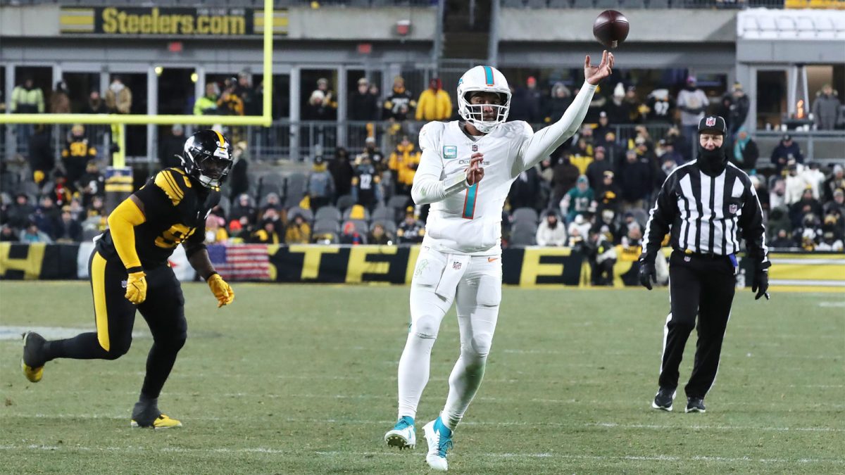 Miami Dolphins quarterback Tua Tagovailoa (1) throws a touchdown pass against the Pittsburgh Steelers during the fourth quarter at Acrisure Stadium.