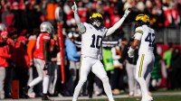 Michigan Wolverines defensive back Zeke Berry (10) celebrates during the first half of the NCAA football game against the Ohio State Buckeyes at Ohio Stadium in Columbus on Saturday, Nov. 30, 2024.