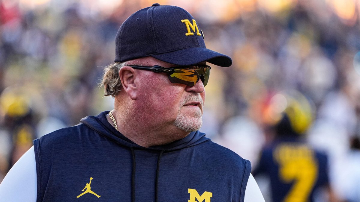 Michigan defensive coordinator Wink Martindale watches warm up ahead of the New Mexico game at Michigan Stadium in Ann Arbor on Saturday, August 30, 2025.