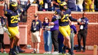 Michigan linebacker Cole Sullivan (23) celebrates an interception against Washington during the second half at Michigan Stadium in Ann Arbor on Saturday, Oct. 18, 2025.