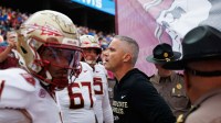 Florida State Seminoles head coach Mike Norvell waits to run on the field before a game against the Florida Gators at Ben Hill Griffin Stadium.