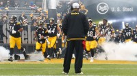 he Pittsburgh Steelers take the field as head coach Mike Tomlin (middle) looks on before the game against the Kansas City Chiefs at Acrisure Stadium.