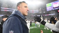 New England Patriots head coach Mike Vrabel looks on after the game against the Houston Texans in an AFC Divisional Round game at Gillette Stadium.
