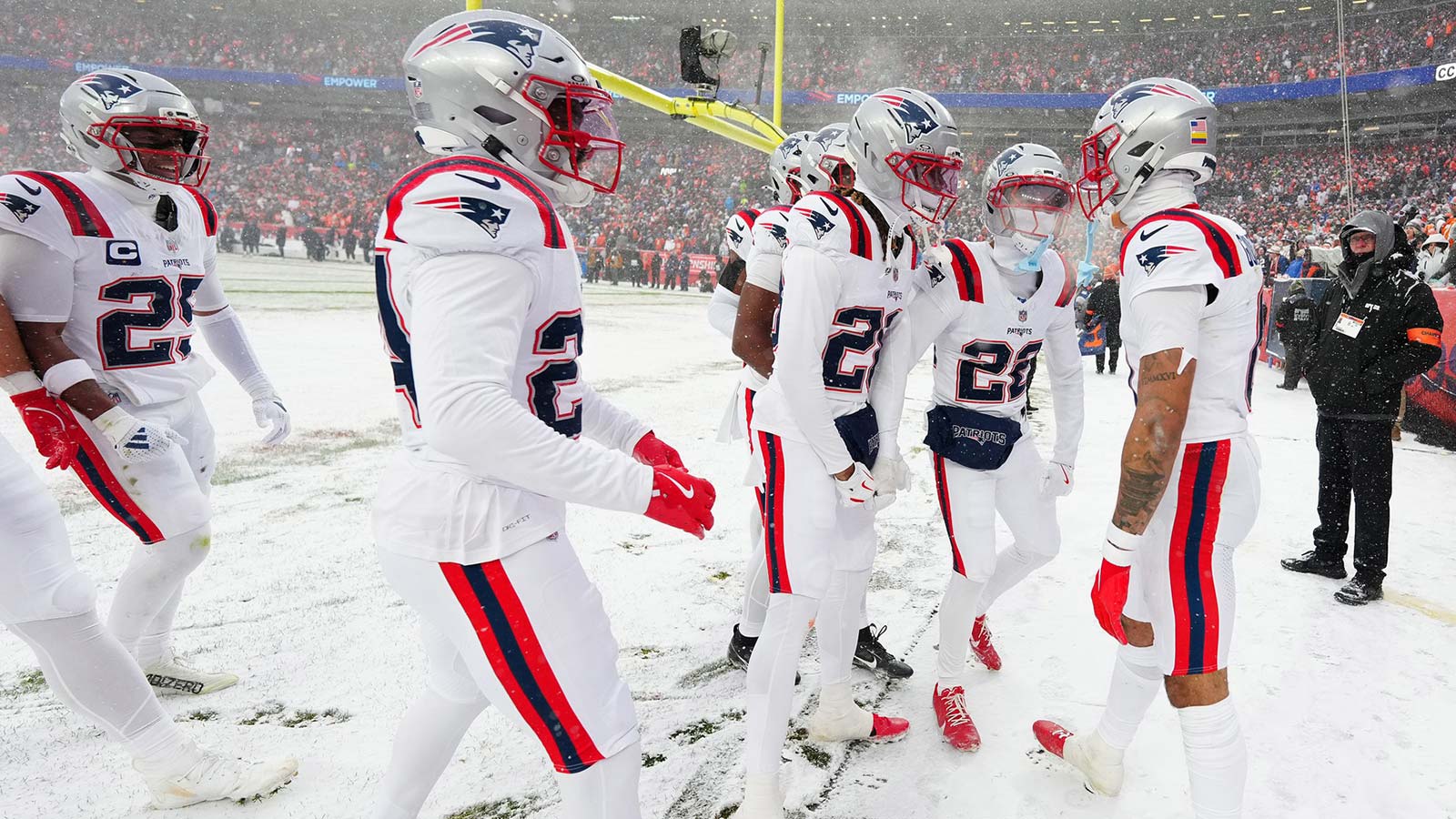 New England Patriots cornerback Christian Gonzalez (0) reacts after an interception against the Denver Broncos during the 2026 AFC Championship Game at Empower Field at Mile High.