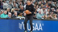 Milwaukee Bucks Head Coach Doc Rivers holds the ball in the second half against the San Antonio Spurs at Frost Bank Center.